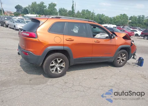 2015 Jeep Cherokee Trailhawk from USA, damaged, VIN 1C4PJMBSXFW776658